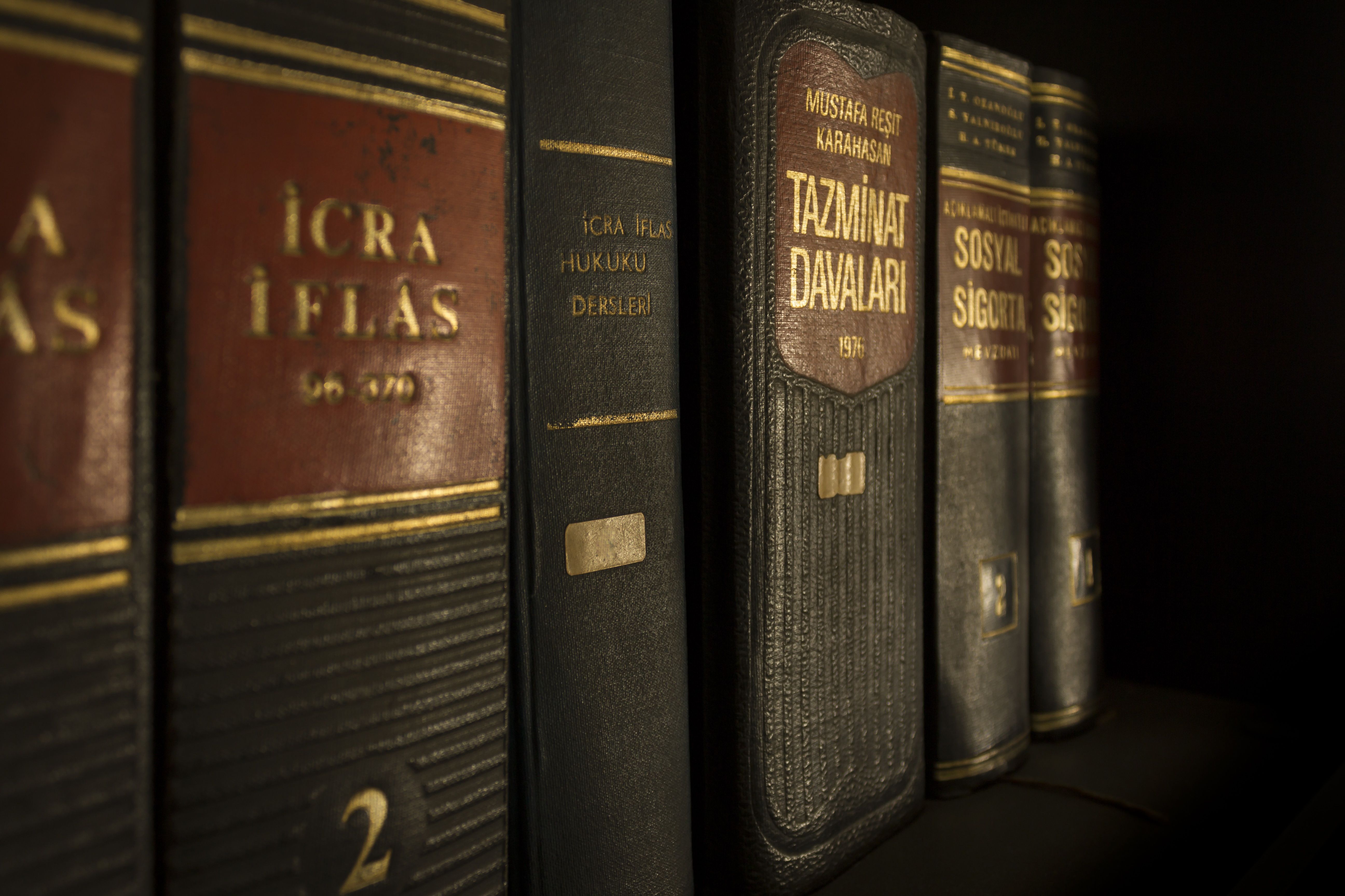 Close-up of law and regulation books on a bookshelf